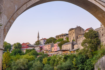 Fototapeta na wymiar Old town of Mostar and Neretva River at sunset time in Bosnia and Herzegovina