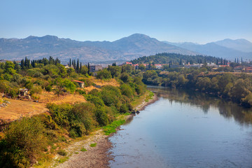 Fototapeta na wymiar Scenery of Moraca river in Podgorica from Montenegro