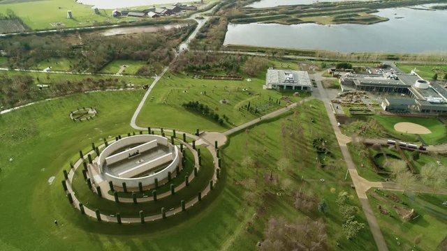 High aerial shot of The Armed Forces Memorial at The National Arboretum, panning wide aerial showing the new Rememberance Centre