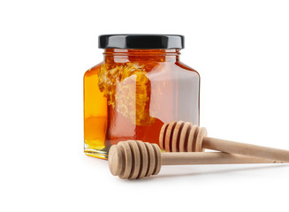 honey glass bottle and dipper isolated on white background, File contains a clipping path.