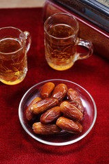 Dates fruit on carpet background