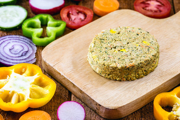 Vegan hamburger made without meat, without elements of animal origin, can be made of corn, potatoes, textured soy protein, legumes, tofu, mushrooms, cereals etc.