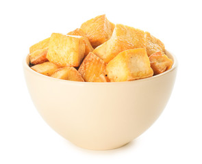 Bowl with tasty tofu cheese on white background