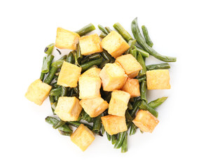 Tasty tofu cheese and vegetables on white background