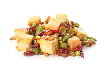 Tasty tofu cheese and vegetables on white background