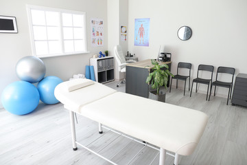 Office of massage therapist in modern medical center
