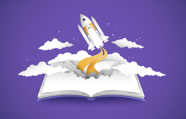 Open book of 3d papercut space ship rocket