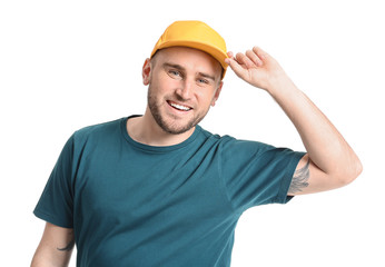 Handsome man in stylish cap on white background