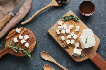 Composition with tasty cut feta cheese on table