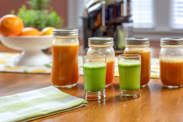 Glasses of fresh raw celery juice on the kitchen table
