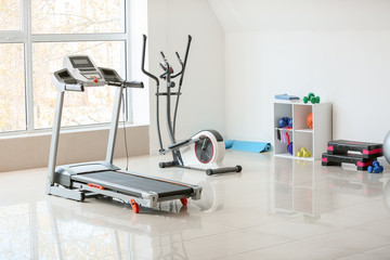 Interior of gym with modern equipment