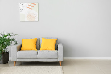 Interior of modern room with comfortable sofa