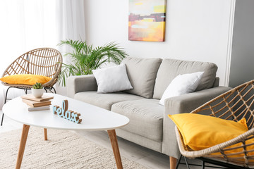 Interior of modern room with comfortable sofa