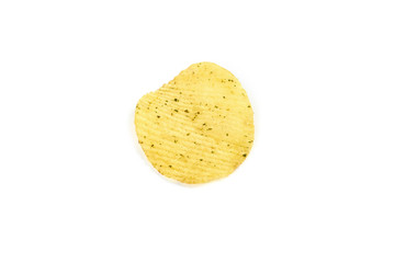 Yellow crispy ridged potato chips on white background