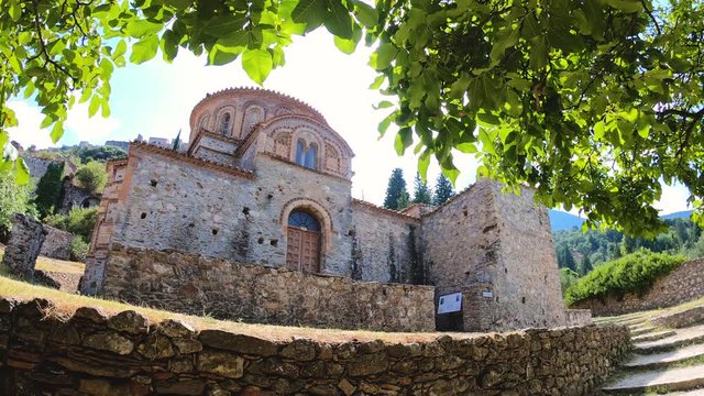 Slow motion walking in byzantine medieval fortified despotate of Mystras on Mount Taygetus near Sparti town, Laconia, Peloponnese, Greece.