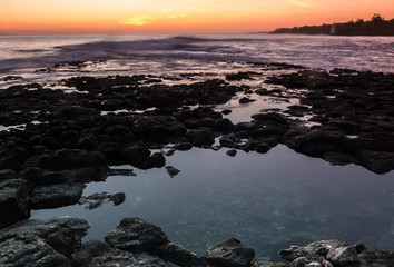 Sunset Reflecting in Tide Pool at Kukuiula Landing Park, Kalaheo, Kauai, Hawaii, USA