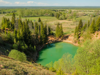 Fototapeta na wymiar Sea Eye Lake with turquoise water in the Republic of Mari El, Russia