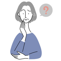 Obraz premium 不思議に思う様子の年配女性