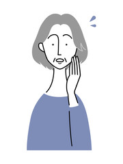 驚いた様子の年配女性