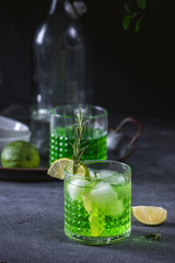 Refreshing carbonated drink from tarragon with ice and lime