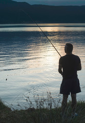 Silhouette of fisherman