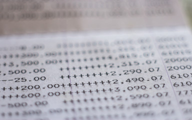 bank account. Close up financial report statement monthly book bank account passbook saving money