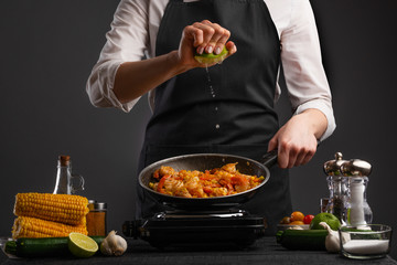 Chef cook fries noodles with shrimp and vegetables. Cooking food