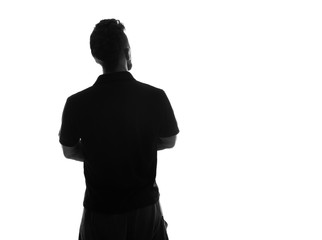 Back side silhouette of male person , back view back lit over white