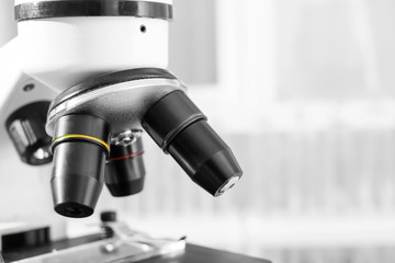 Modern microscope in scientific laboratory, closeup