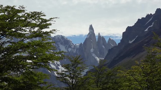 Dinamic zoom view of Mt Cerro Torre and Fitz Roy, Patagonia, bright clouds