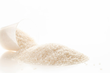 white rice isolated on a white background close up