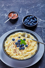 millet porridge topped with flax seeds, close-up