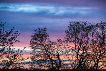 Fototapeta na wymiar Sunset orange blue sky with clouds background