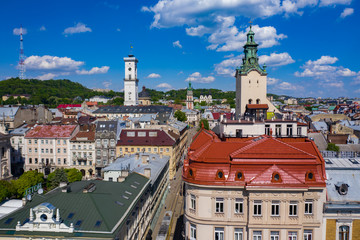 Obraz premium Aerial view on Jesuit Church, City Hall and Latin Cathedral in Lviv, Ukraine from drone
