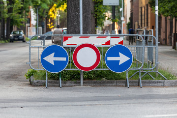 Road signs. Deviation on the route, signaling of an obstacle and deflection arrows to avoid it....