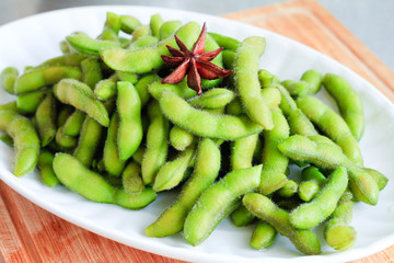 Chinese/Japanese food: A plate of Edamame close up