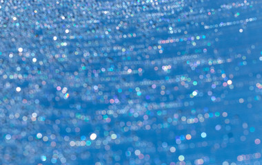 multicolored bokeh from water drops as a background