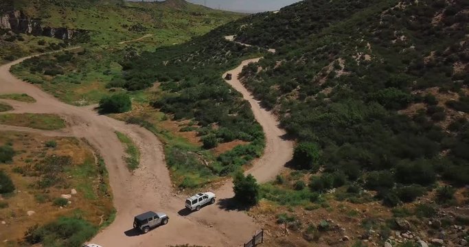 4x4 Off-road Vehicles Rock Crawling and Driving on Mountain Trails