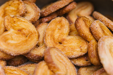 Cookies sprinkled with sugar close-up. Delicious dessert. Background for cooking.