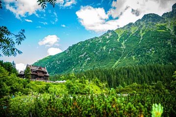 Mountain landscape with a wooden house - Mountain shelter in Tatra eye of the sea