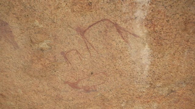 Close-up of ancient painting on rock formation - Spitzkoppe, Namibia