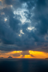 Landscape sunrise on Hon Chong cape, Nha Trang, Vietnam. Travel and nature concept. Morning sky, clouds, sun and sea water