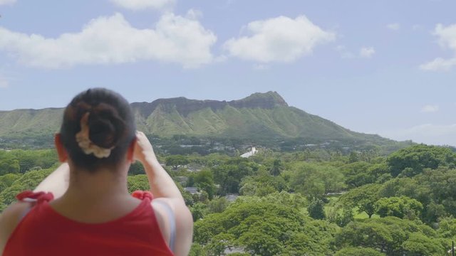 Girl Takes A photo on Honolulu Hawaii island in 4K Slow motion 60fps
