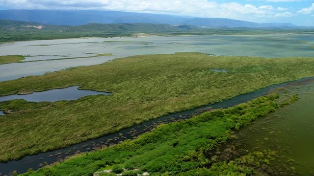 Drone view of Lagoon Cabral in Dominican republic. Aerial circling