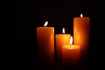 Candle black background of mourning funeral moment of silence	