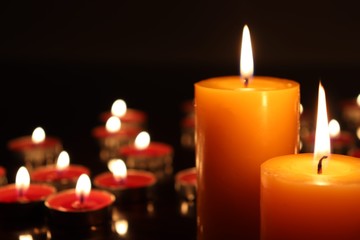 Candle black background of mourning funeral moment of silence	