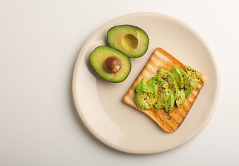 Healthy diet. Sandwich with sliced avocado, salt and pepper, on toasted bread for a healthy Breakfast or snack, copy the space.Food ration.