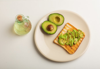 Healthy diet. Sandwich with sliced avocado, salt and pepper, on toasted bread for a healthy Breakfast or snack, copy the space.Food ration.