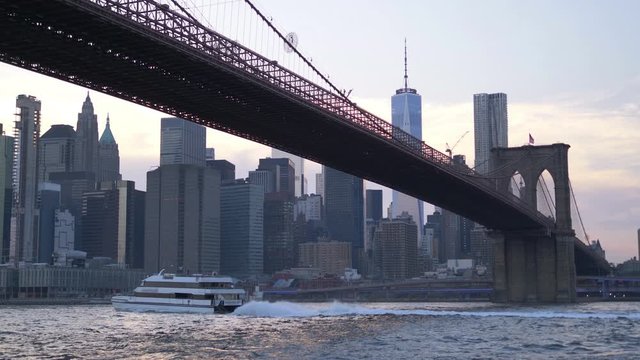 Brooklyn Bridge in New York at sunset in 4K Slow motion 60fps