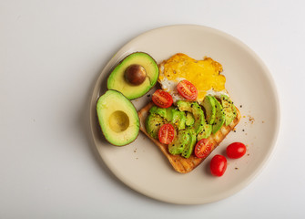 Healthy diet. Sandwich with sliced avocado, salt and pepper, on toasted bread for a healthy Breakfast or snack, copy the space.Food ration.